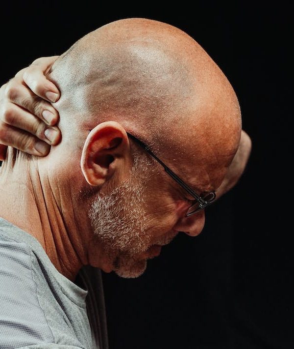 A man having neck pain