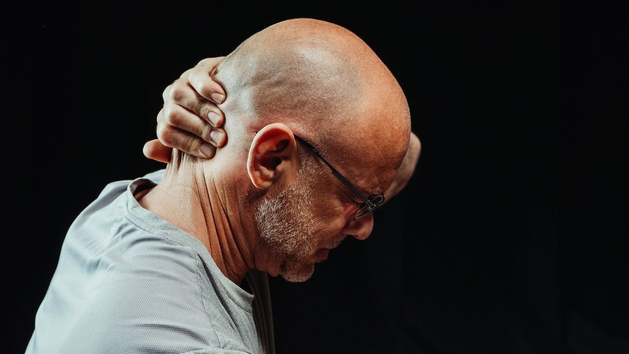 A man having neck pain
